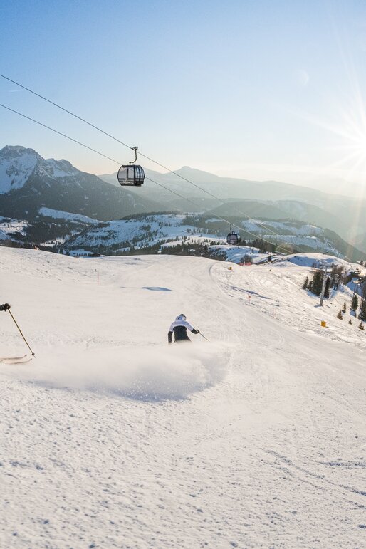 Downhill skier King Laurin Slope in Carezza | © Carezza Dolomites/Harald Wisthaler