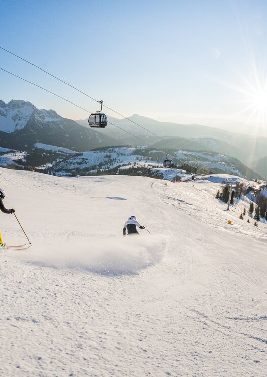 Sciatore in discesa pista Re Laurino di Carezza | © Carezza Dolomites/Harald Wisthaler