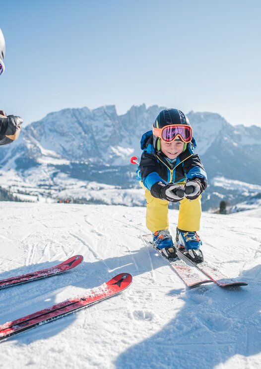 Family fun in Carezza with a view of Latemar | © Carezza Dolomites/Harald Wisthaler